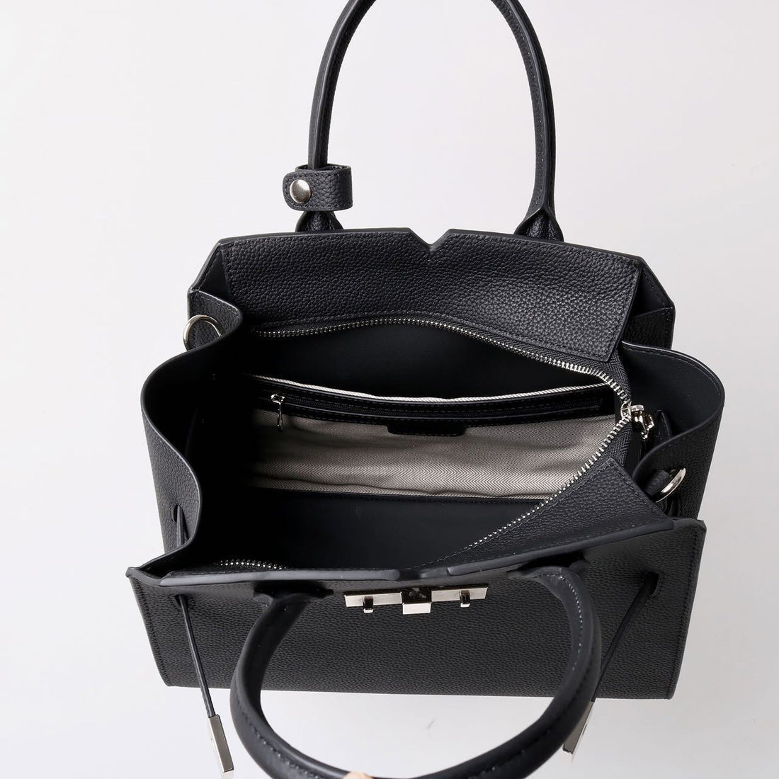 AURORA STRUCTURE” — the leather power bag for everyday icons