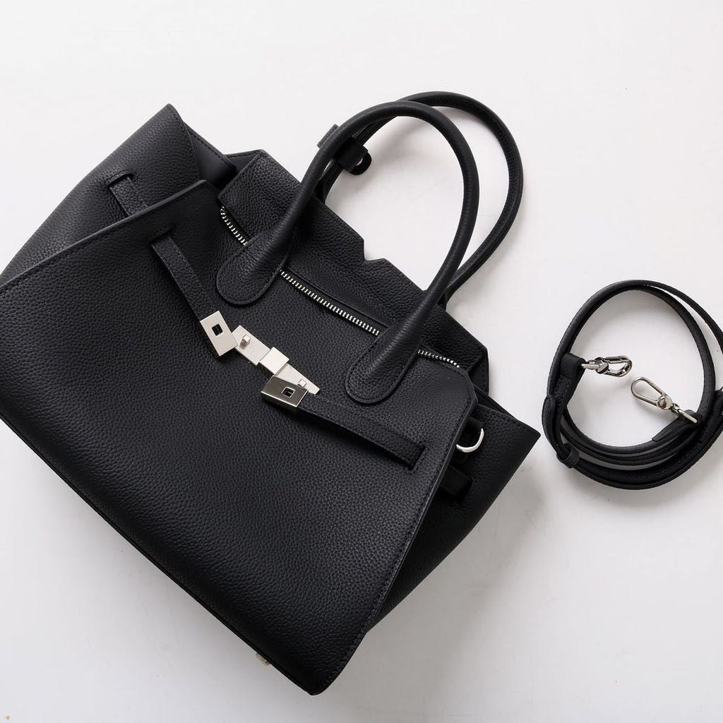 AURORA STRUCTURE” — the leather power bag for everyday icons