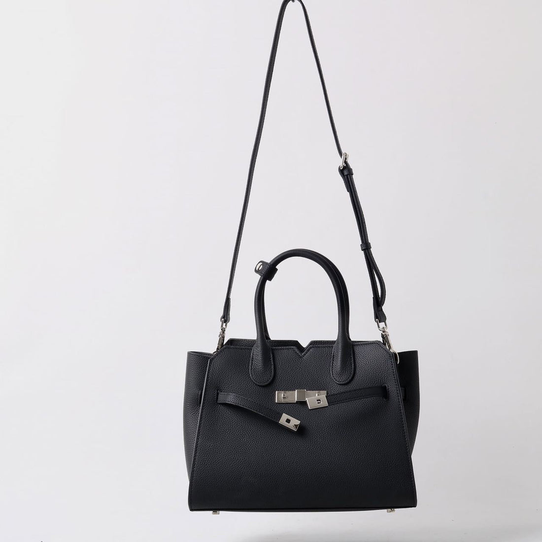 AURORA STRUCTURE” — the leather power bag for everyday icons