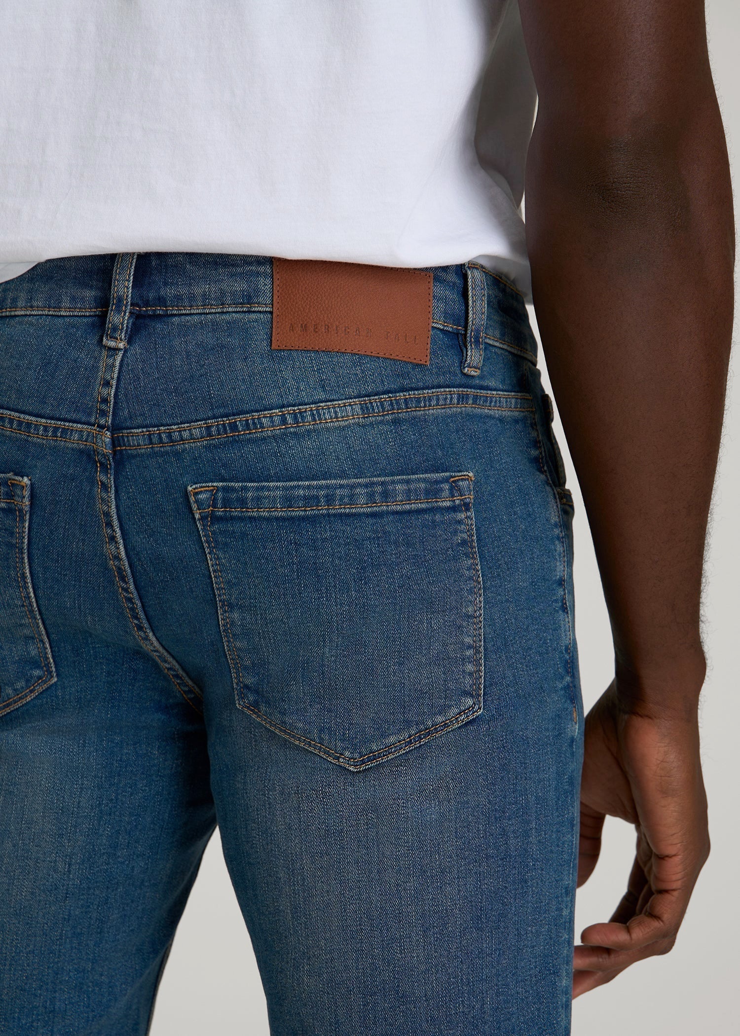 Carman Tapered Fit Jeans in Worn Blue