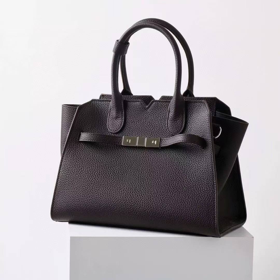 AURORA STRUCTURE” — the leather power bag for everyday icons