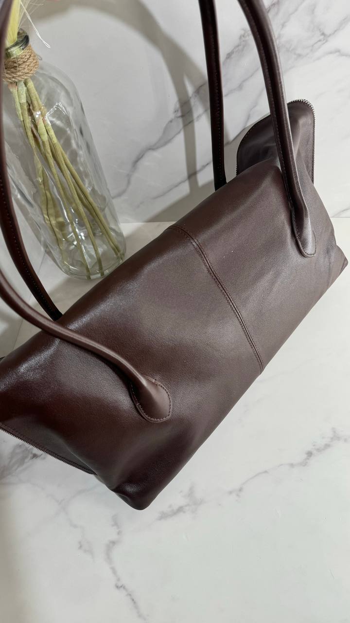 Executive Traveler — a large leather bag for business and travel.