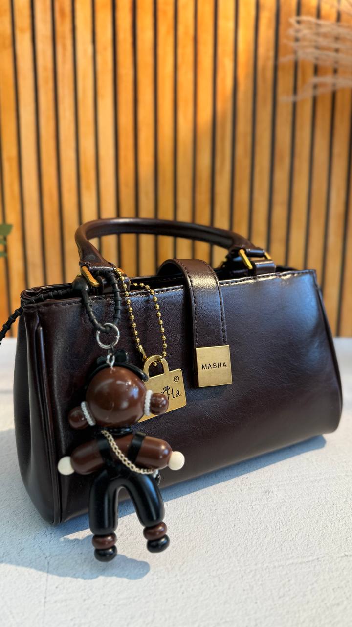 Chic Charm” – Leather Bag with Adorable Details