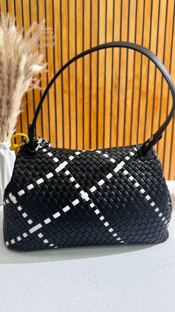 Artisan Weave-The Art of Handwoven Elegance — a handmade leather bag