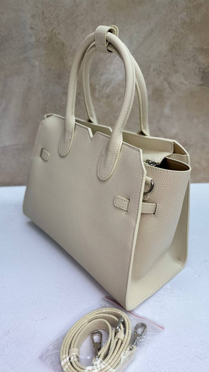 AURORA STRUCTURE” — the leather power bag for everyday icons
